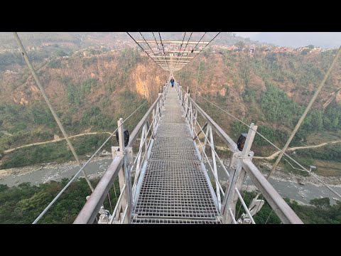 Видео: Непал: опасный мост между двумя деревнями, горячие источники и водопад, окрестности Аннапурны