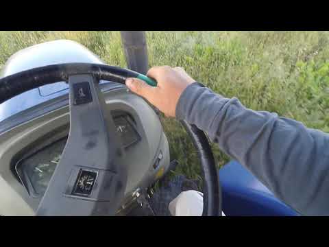 Видео: міні трактор дтз 244 4р   в роботі   копаємо картоплю 2020