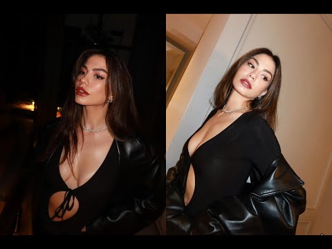 Видео: Ее красота пленила! Ее позы в черном были объектом восхищения.