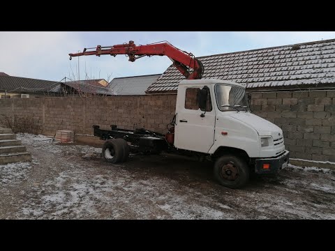 Видео: установка манипулятора и надрамника