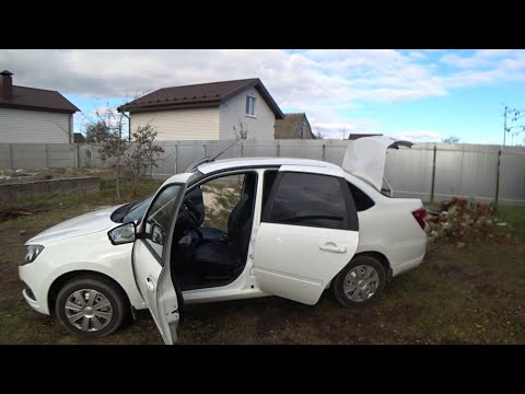 Видео: Установка задних парктроников на Лада Гранта