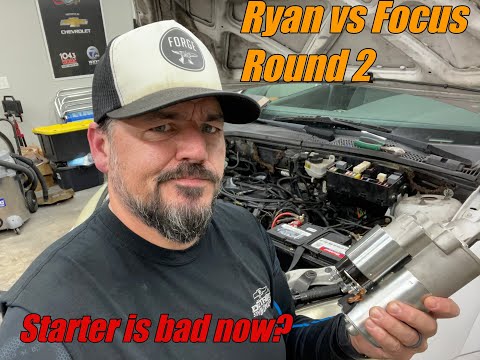 Видео: Замена стартера в Фокусе 2002 года