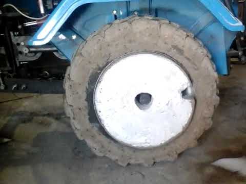 Видео: Грузи колес на мототрактор