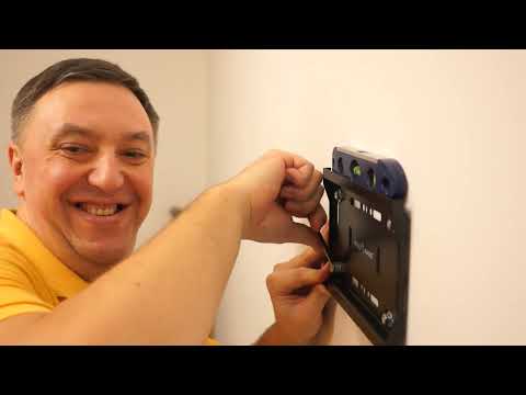 Видео: Подвес телевизора на кронштейн