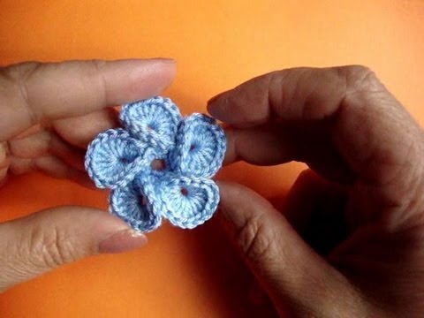 Видео: Вязаные цветы Урок 31 Crochet flower pattern かぎ針編みの花のパターン