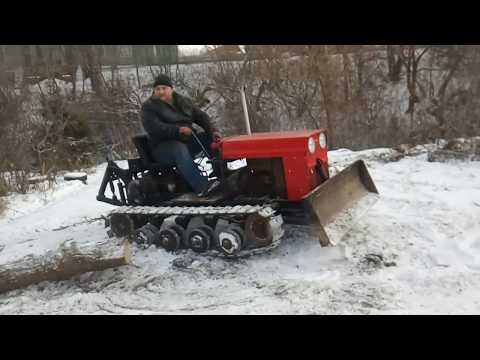 Видео: самодельный мини трактор на гусеницах заготовка дров MINI DOZER