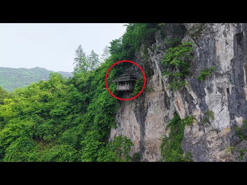 Видео: Вы когда-нибудь видели дом, висящий на скале?