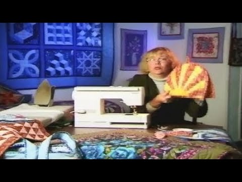 Видео: Лоскутное шитье. Шьем "солнечную" грелку на чайник. Мастер класс