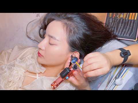 Видео: Чистка ушей ASMR + массаж головы + почесывание головы: откройте для себя глубокое снятие стресса.
