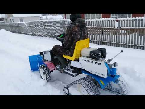 Видео: Чистим снег мотоблоком с  передним адаптером.