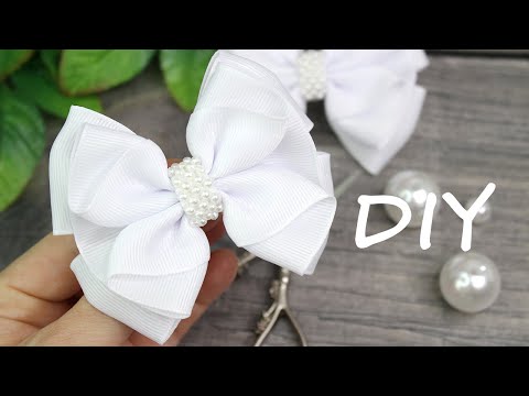 Видео: DIY Ribbon bow / Как сделать бант из лент / Мастер-класс бантик