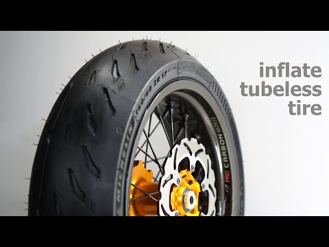 Видео: Как накачать бескамерное колесо мотоцикла. How to inflate tubeless tires motorcycle, using belts.