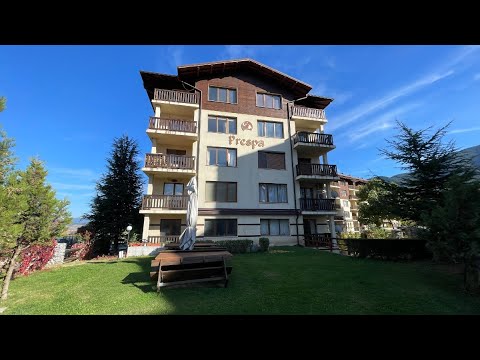 Видео: Тристаен апартамент с камина за продажба в сграда с ниска такса в Банско