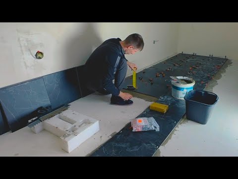 Видео: Как положить керамогранит на пол не имея опыта ?Укладка керамогранита на теплый пол!