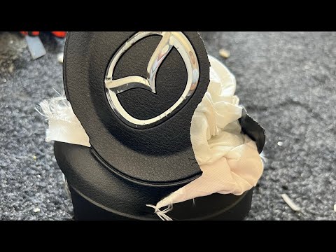 Видео: Вторая жизнь подушки безопасности после дтп, или как восстановить подушку безопасности руля Mazda
