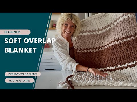 Видео: Как сшить детское одеяло из перекрывающихся цветов — простой урок по вязанию спицами крупной вязк...