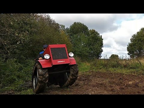 Видео: Гусеничный минитрактор, боронуем,культивируем, пашем ,сеем рапс.