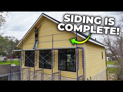 Видео: Гараж мечты готов! Мы установили фиброцементный сайдинг для защиты от влажности!