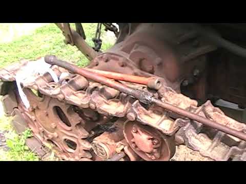 Видео: Трактор КТЗ Т-70. Выбиваем торсионный вал. Разбираем промежуточную стяжку.