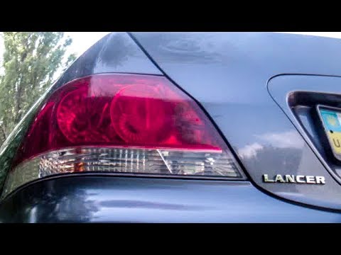 Видео: Снятие заднего фонаря с Мицубиси Лансер 9 (Mitsubishi Lancer 9 ). Замена лампочек заднего фонаря .