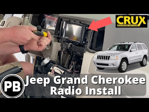 Видео: Установка радиоприемника Jeep Grand Cherokee 2005 - 2010
