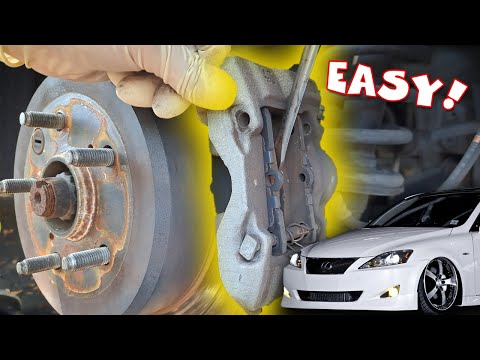 Видео: Замена задних колодок и роторов Lexus IS250 2006 - 2013