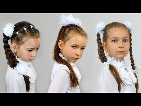 Видео: Три простых причёски в школу для девочек младших классов и в детский сад. Как плести косички .