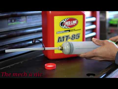 Видео: Замена жидкости в механической коробке передач Nissan Versa Note / Micra