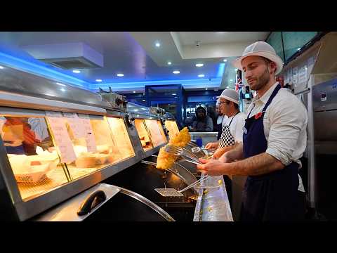 Видео: В оживленном лондонском магазине Fish & Chips: отец и сын хранят традиции