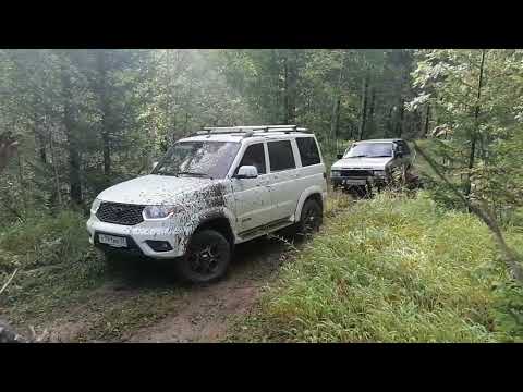 Видео: Уаз Патриот против Nissan Terrano.