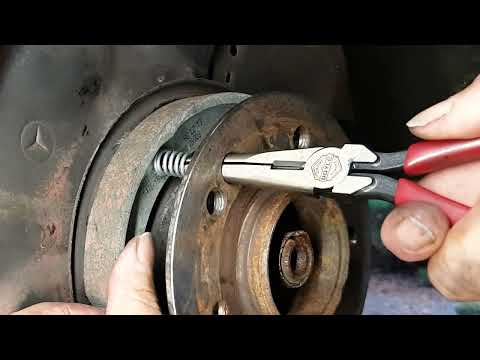 Видео: Замена колодок аварийного или стояночного тормоза Mercedes W210