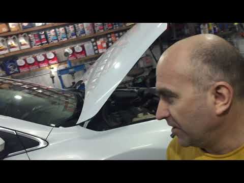 Видео: Мазда CX9 замена помпы.