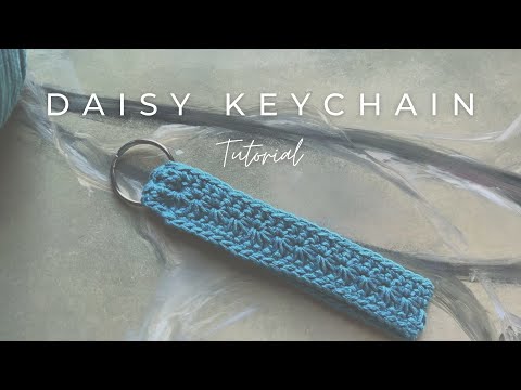 Видео: Мастер-класс по вязанию брелока-ромашки крючком