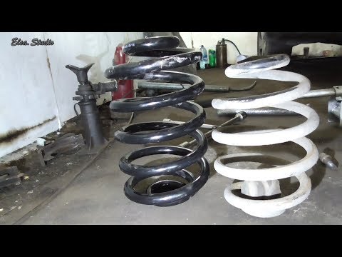 Видео: Замена задней пружины Opel Omega B