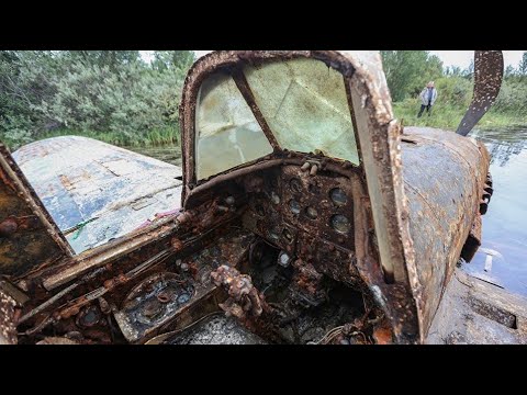 Видео: ПОДЪЁМ ШТУРМОВИКА ИЛ-2 С ТРЕМЯ МУМИФИЦИРОВАННЫМИ ЧЛЕНАМИ ЭКИПАЖА !