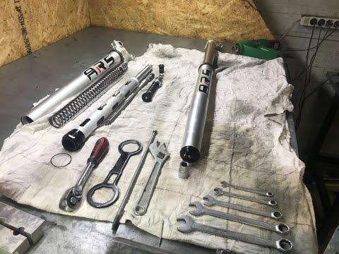 Видео: Обслуживание и тюнинг подвески ARS. часть 2. Вилка