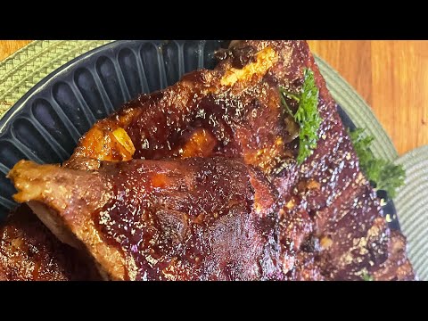 Видео: Сочные свиные ребрышки запеченные в духовке .