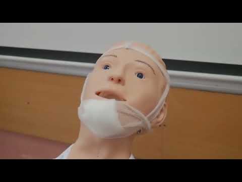 Видео: СОП Хирургия Пращевидная повязка на подбородок