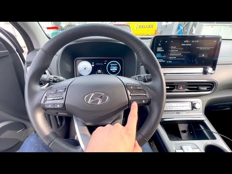 Видео: Hyundai Kona EV Facelift 2023 - разбор интерьера и функций (Куда жать-то?) | CarBrains