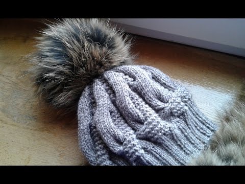 Видео: Шапка спицами из объемных кос. Часть 2 // Women's hats knitting