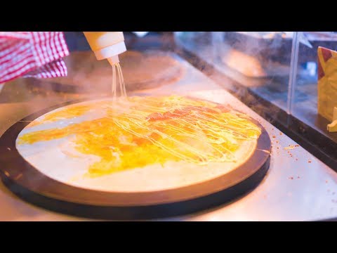 Видео: Вкусный жареный кунжутный креп знаменит в Киото, Япония! Гомая креп-до!