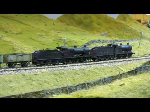 Видео: Фаворит выставки моделей железных дорог: «Вершина» колеи O