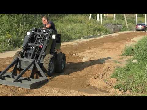 Видео: Мини погрузчик Land Digger с планировщиком