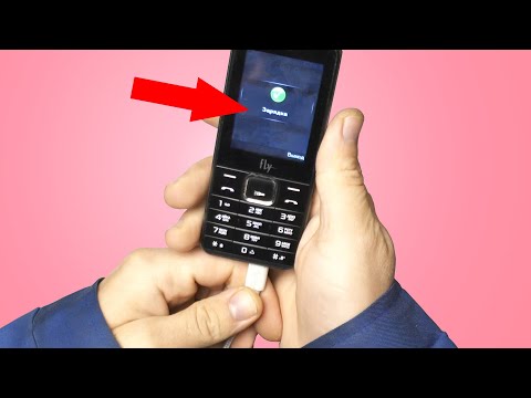 Видео: Не заряжается Fly  FF243. Менять гнездо?