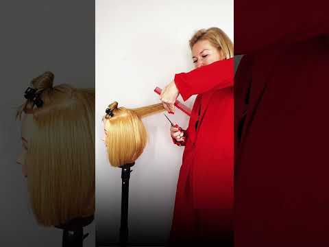 Видео: Градуированная стрижка с круглым дизайном у лица