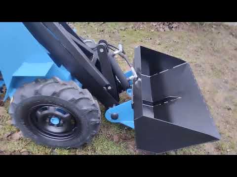 Видео: #Мини Погрузчик #новый тракторок обзор