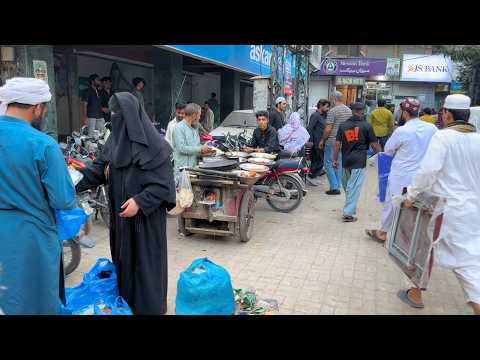 Видео: 🇵🇰 Лахор, Пакистан: хаос и уличная еда на рынке Шах-Алам