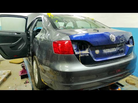Видео: Jetta 2.5SE . Рихтовка проема люка. Установка и регулировка крышки багажника.