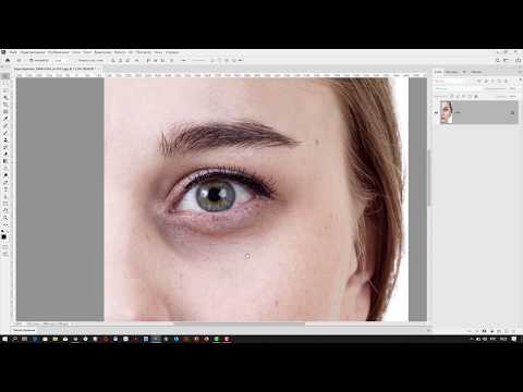 Видео: Как убрать темные круги под глазами в Adobe Photoshop