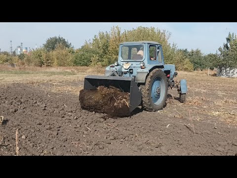 Видео: работа ковша задней навески юмз.мтз.т40.